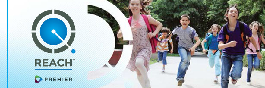 Image showing the REACH™ logo superimposed over a group of kids running.